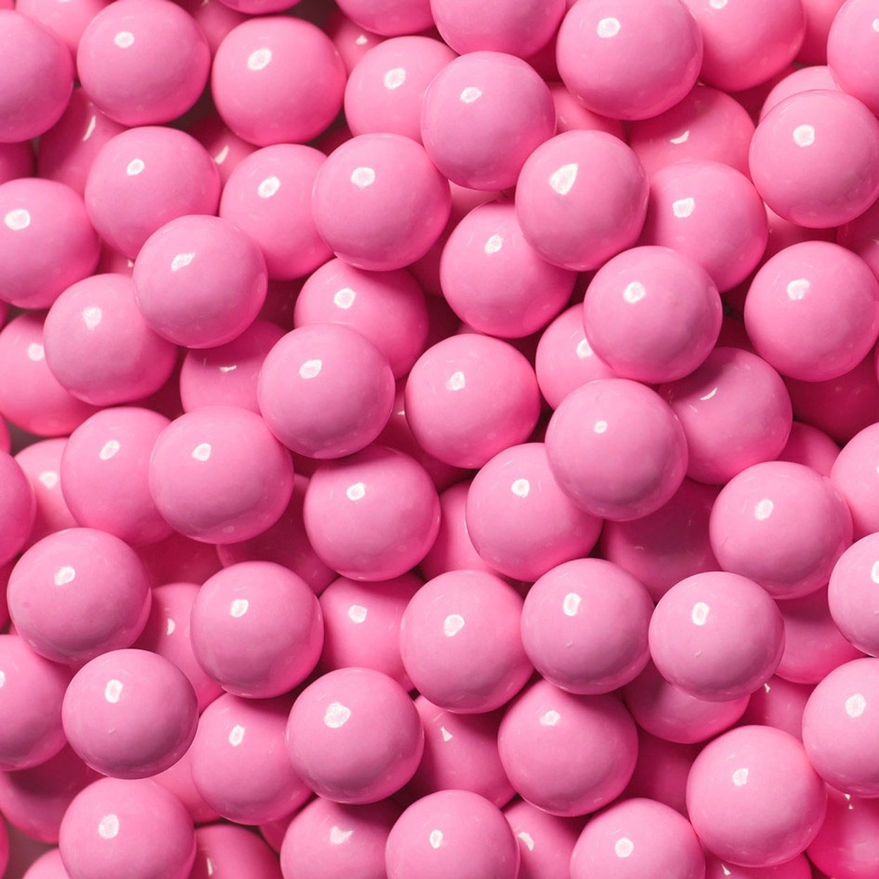 Плотные розовые. Розовый цвет. Розовые конфеты. Розовые леденцы. Конфеты розовые круглые.