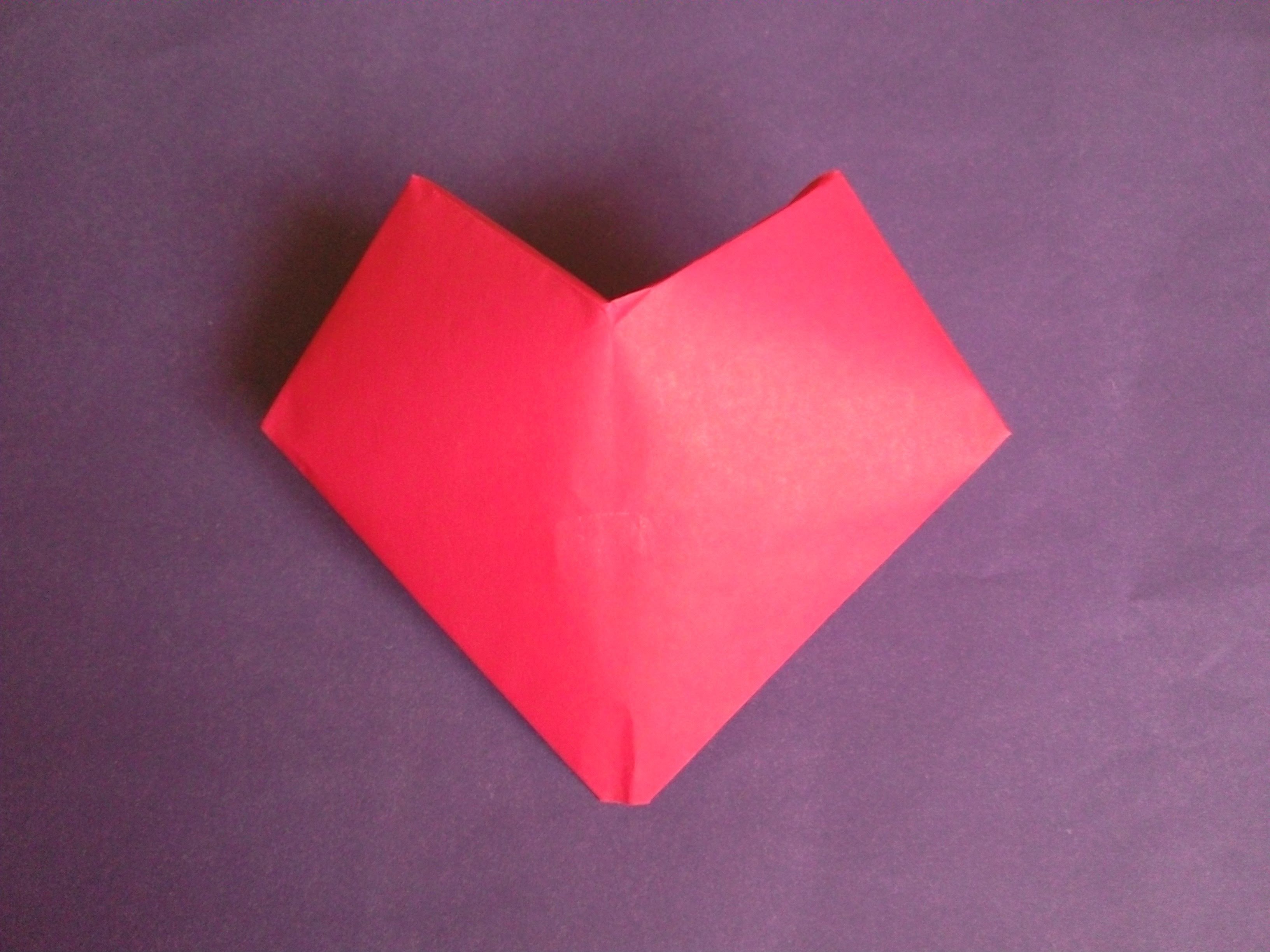 Легкие сердечки из бумаги. Оригами сердце. Оригами сердечко. Оригами сердечко из бумаги. Объемные сердечки из бумаги.